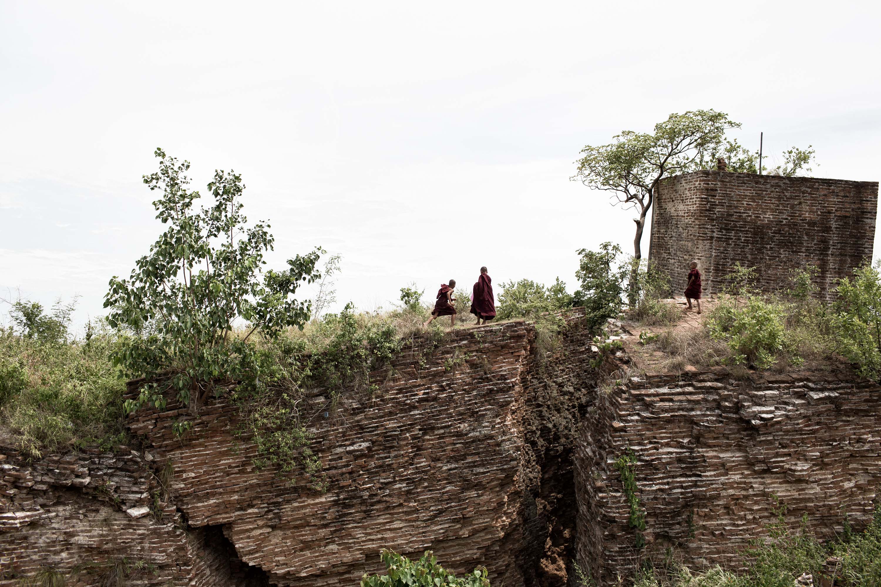 Young Monks play on top of Mingun Pagoda near Mandalay