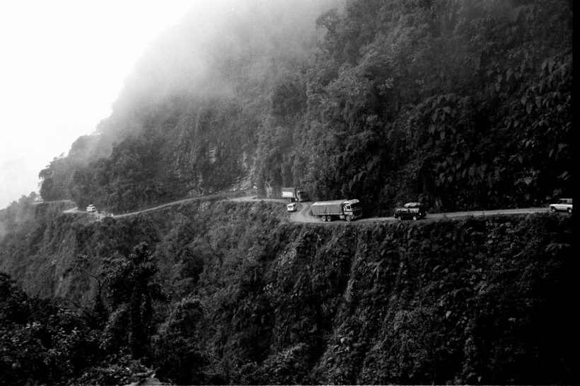 The Yungas Road, also known as the "Death Road", is notoriously dangerous due to its narrow, unpaved sections, sharp turns, and sheer cliffs without barriers. Bolivia